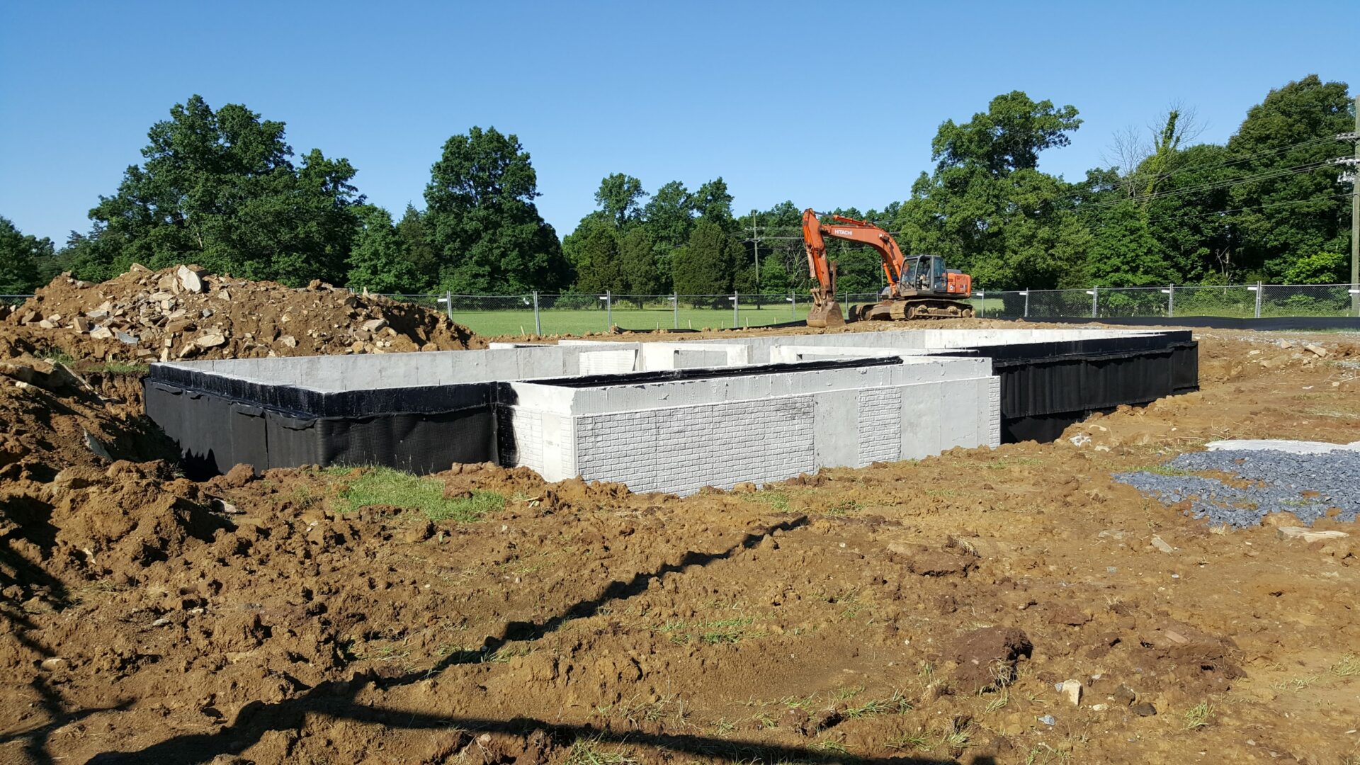 A basement of a house with concrete walls