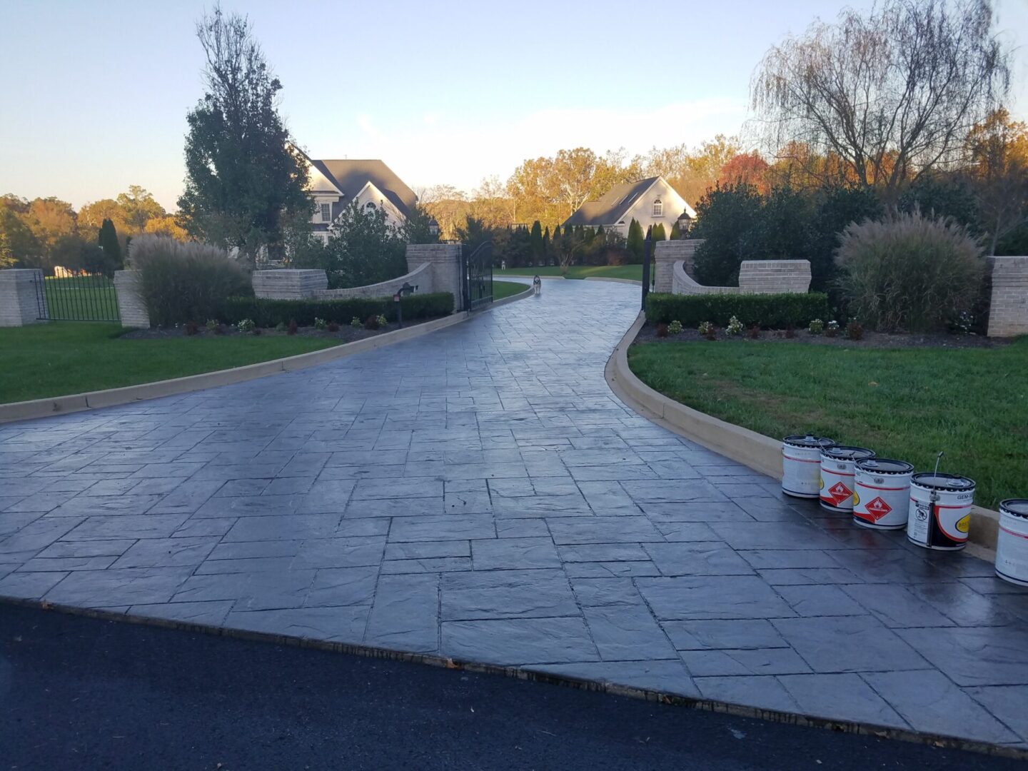 An entrance to a property with buckets of paint at the side