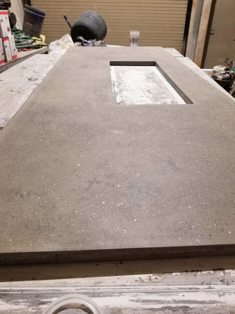 A slab of concrete on a worktable