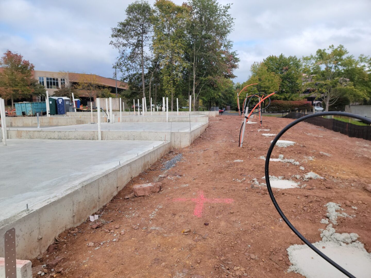 Concrete flooring next to soil