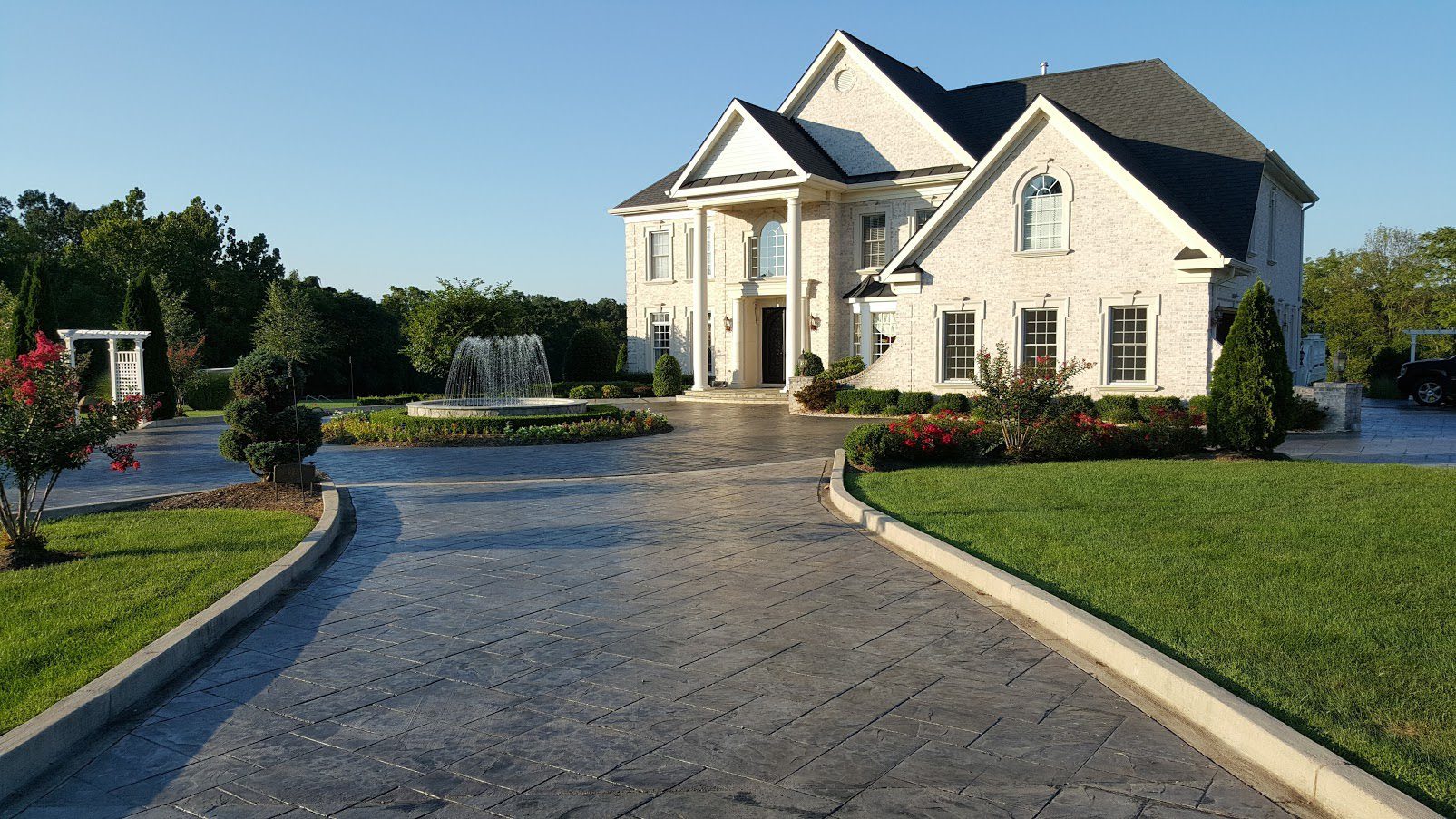 A high-end property with a fountain